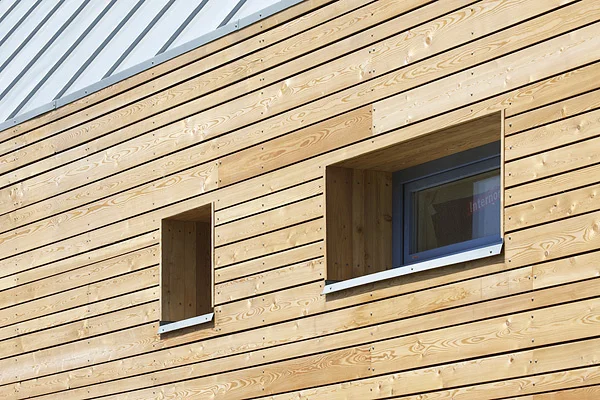 Wooden facade with windows